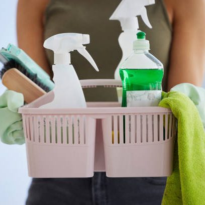 Cleaning service, product basket and cleaner hands for house work, office or home with plastic bottle, product and cloth gear. Woman zoom with hygiene liquid or detergent for spring cleaning career